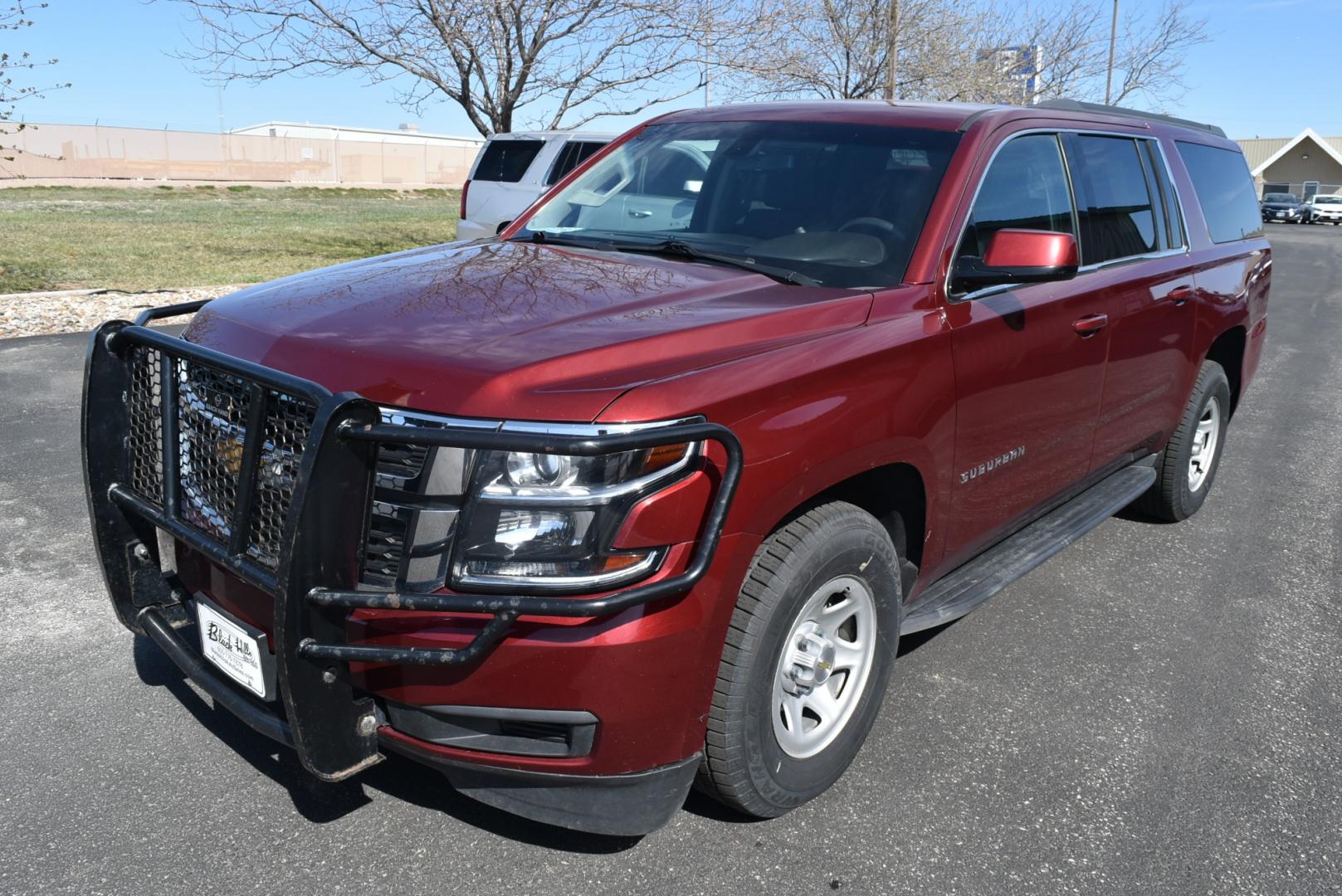 2019 Maroon /Black Chevrolet Suburban LS Fleet (1GNSKKKCXKR) with an 5.3L V-8 engine, 6-Speed Automatic transmission, located at 1600 E Hwy 44, Rapid City, SD, 57703, (605) 716-7878, 44.070232, -103.171410 - Photo#2